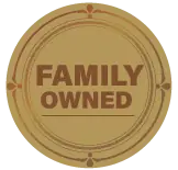 A gold circle with the words `` family owned '' written inside of it.